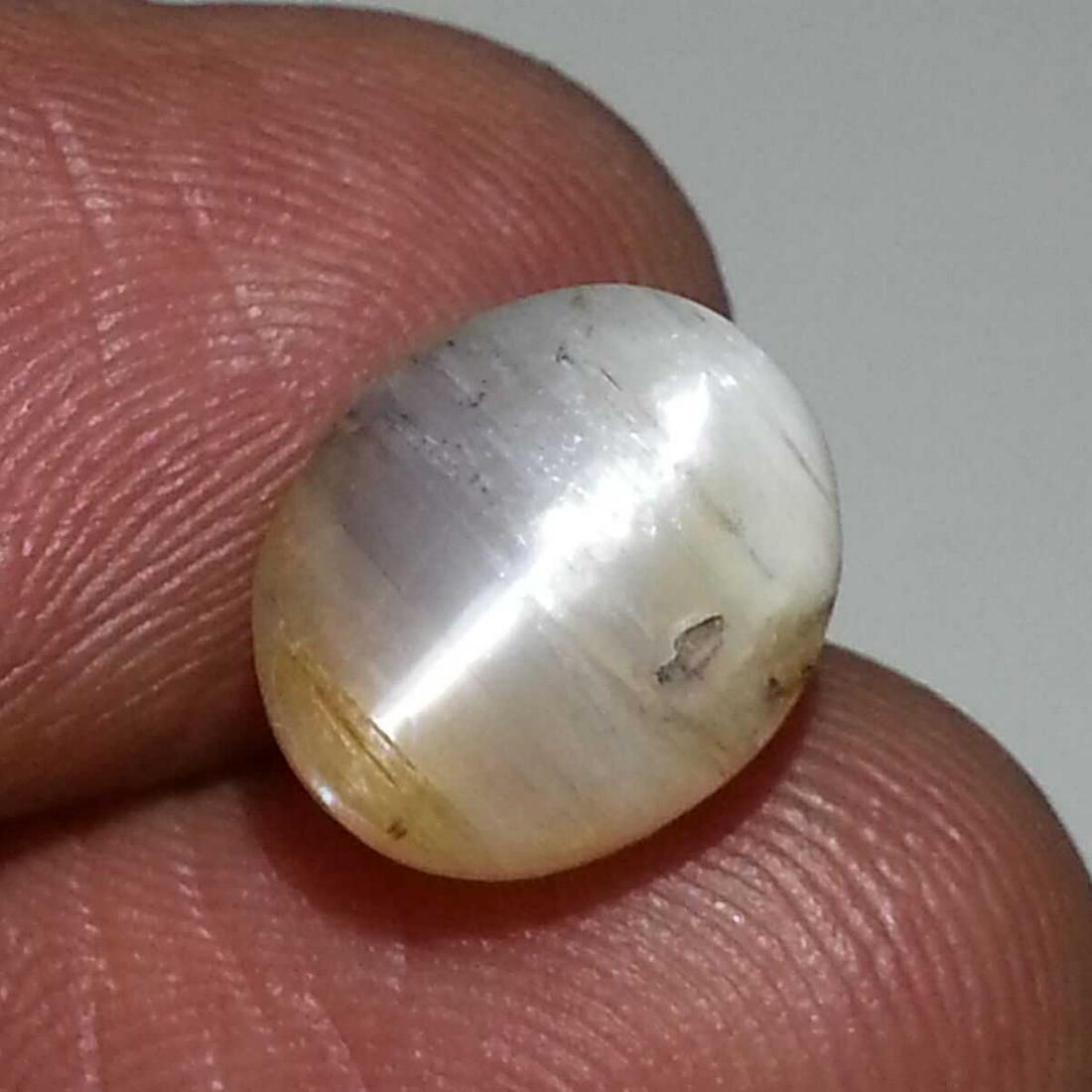 4.57 ct Natural Opal Cat's Eye: No Reserve! Title: 4.57 ct Natural Opal Cat's Eye Color/Clarity: Semi Transparent Gemstones: Loosegemstone Carat Weights: $5 Size/Dimensions: 11.00 x 9.20 x 7.90 Additional Information: Oval - Africa 