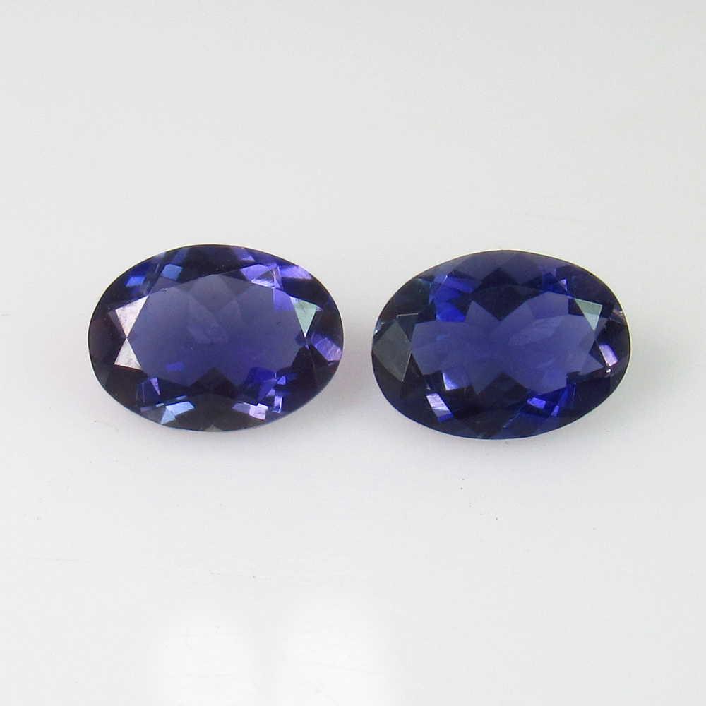 1.80 Ctw Natural Iolite Oval Pair: No Reserve! Title: 1.80 Ctw Natural Iolite Oval Pair Stone Clarity: VVS Loose Gemstone: Iolite Carat Weights: 1.80 Size/Dimensions: 8.00 x 6.00 x 3.50 mm Very Good Luster / Excellent Oval Cut / Origin