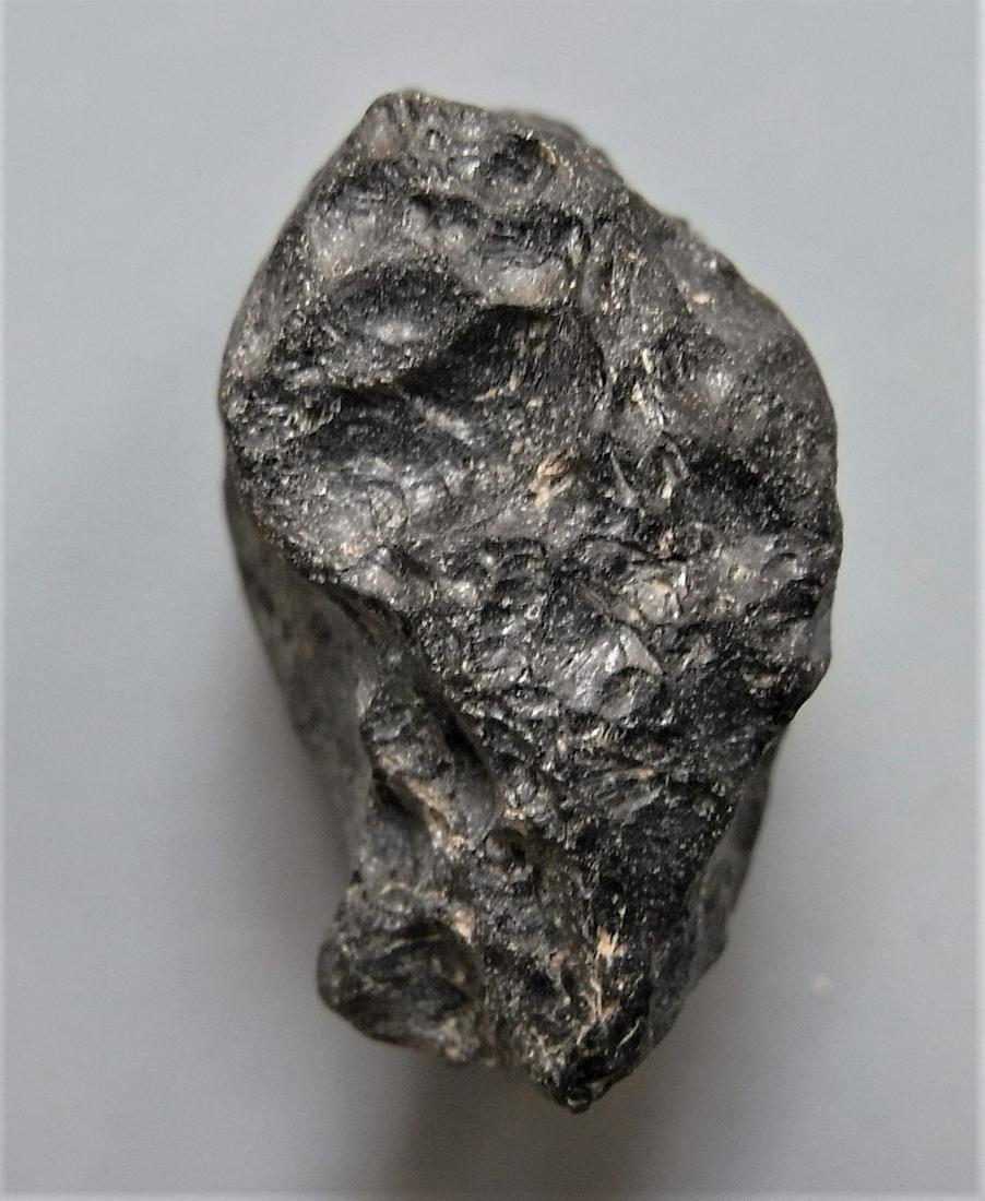 THAILANDITE TEKTITE - FROM METEORITE IMPACT: Title: THAILANDITE TEKTITE - FROM METEORITE IMPACT Origin: Noen Sa-Nga, Chaiyaphum Prov. Thailand Size: 2.1x1.4x1.3 cm / 5 gram Additional Information: irregular shaped thailandite tektite. minor eros