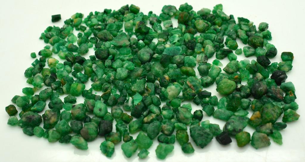 50 Grams Rough Emerald Lot: Title: 50 Grams Rough Emerald Lot Origin: Pakistan Weight: 50 Grams Additional Information: Natural Reserve: $50.00 Shipping: Domestic: Flat-rate of $15.00 to anywhere within the contiguous U.S. Int