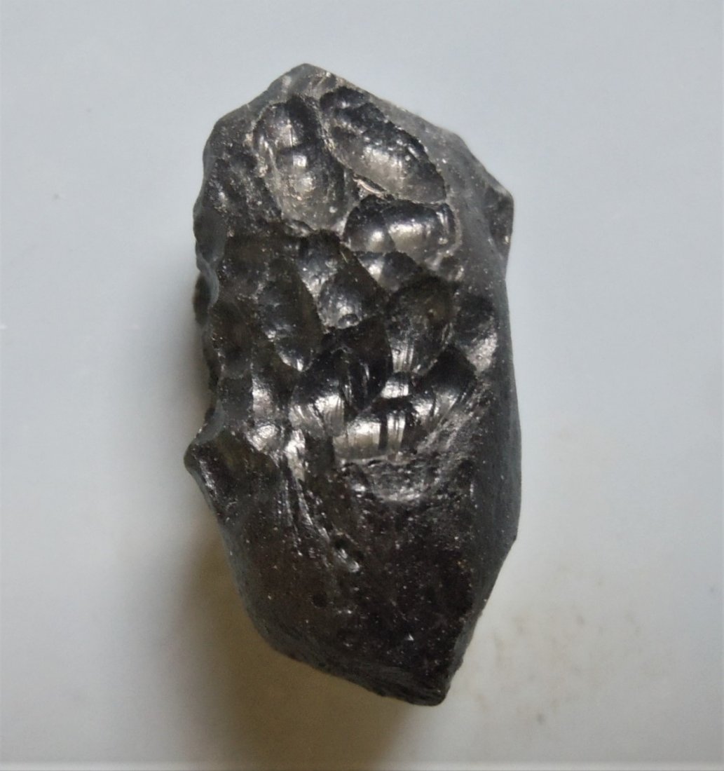 THAILANDITE TEKTITE - FROM METEORITE IMPACT: Title: THAILANDITE TEKTITE - FROM METEORITE IMPACT Origin: Noen Sa-Nga, Chaiyaphum Prov. Thailand Size: 2.3x1.2x1.2 cm / 4 gram Additional Information: square shaped thailandite tektite with smooth an