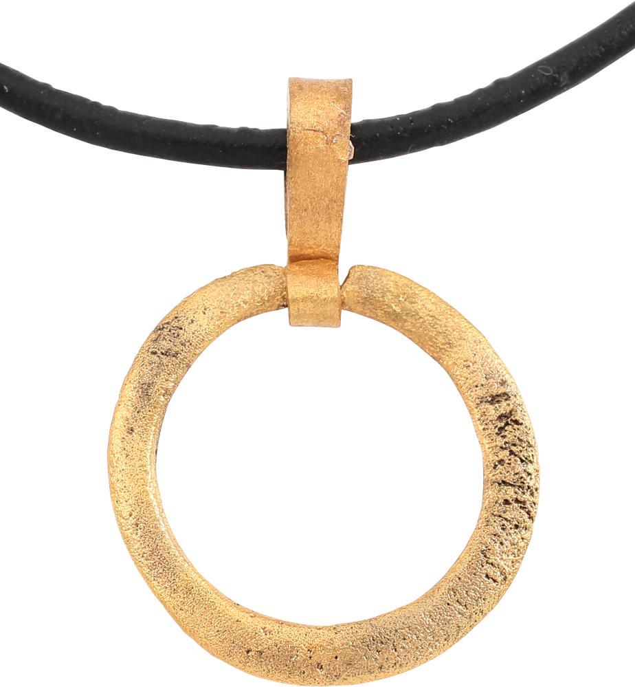 VIKING PROTECTIVE BROOCH PENDANT 10th CENTURY: Circular bronze, 7/8Â” diameter with rounded front and back forming a ridged edge. The surface with light texture from burial. Professionally conserved and the gold surface restored. On a modern bl