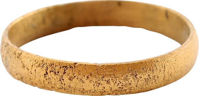 VIKING WOMAN’S WEDDING RING, 10TH-11TH CENTURY AD. Size: Rounded band, 13.4mm. Surface lightly textured from burial. Professionally refurbished with the surface restored in 24karat gold. Fine large example. Gift boxed with certificate of authenticity. Reser