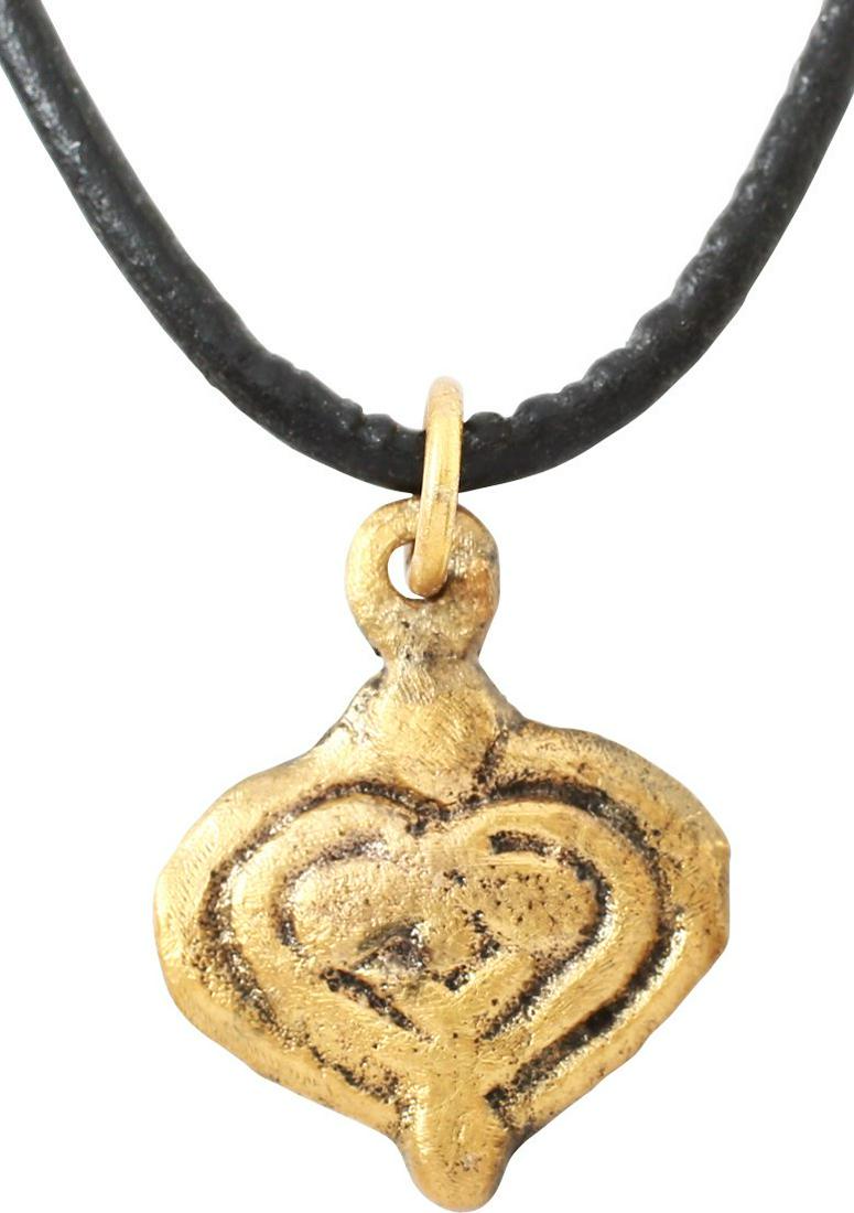VIKING HEART PENDANT 9th-10th CENTURY AD: 7/8Â” height, of elegant form. Broad heart with double edge, the inner scrolling at the cusp to form the central trefoil. The trefoil was a very popular motif in Viking decoration. Stippled ground 