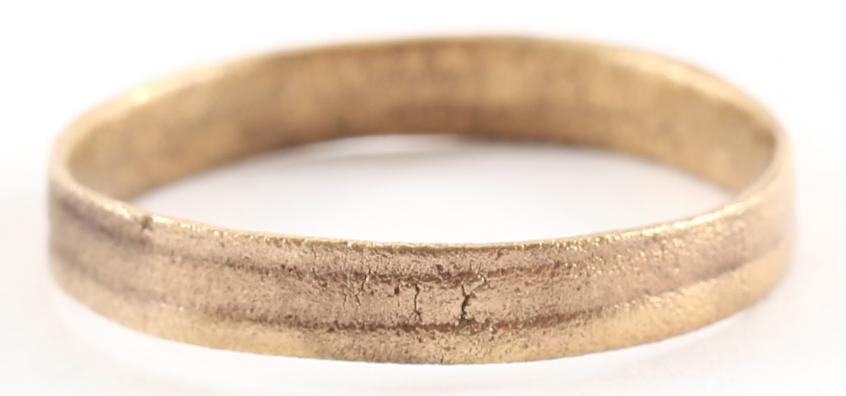 VIKING MAN’S WEDDING RING, 866-1067 AD: S9 3/4. 3.5mm band with twin incised lines dividing the surface into three bands. The 24 karat gold surface professionally restored. Vikings exchanged rings on the pommel of the groomÂ’s sword. Gif