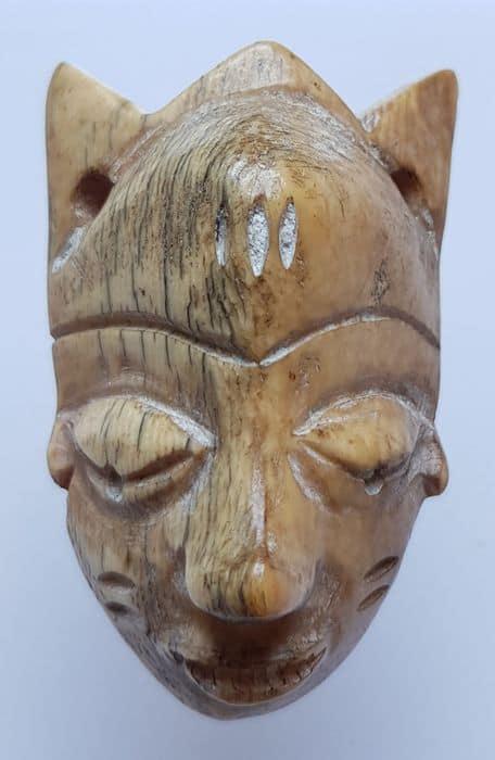 Ikhoko pendants are crafted by the Central PENDE. Most: Title: Ikhoko pendants are crafted by the Central PENDE. Most of the PENDE masks are carved in the Katundu style, which is the name of the very important chiefdom of this central region. The Ikhoko ar