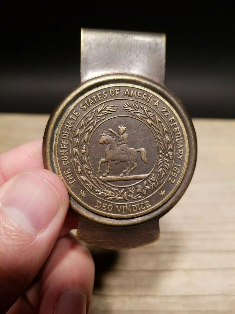 CSA Confederate Seal Brass Money Clip: 2 5/8" Tall x 1 3/4" wide This all solid brass replica money clip will surely make you wonder its age! It is made to look just like the antique The face of this plate has a very pleasing brown patina 