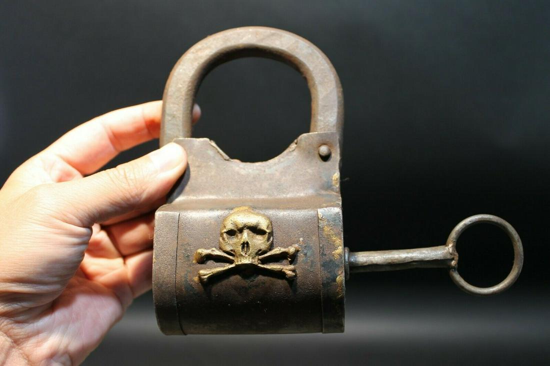 Wrought Iron Trunk Pirate Chest Lock Key Padlock: 6" Tall x 3 1/8" Wide Just wonderful heavy duty antique reproduction pirate padlock with key. Fully functional, looks great on an old truck or chest! Reserve: $25.00 Shipping: Domestic: Flat-rate of $