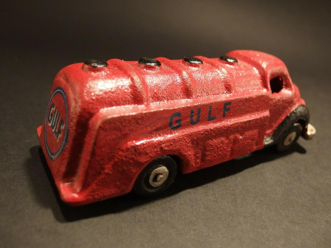 Cast Iron Red Gulf Toy Truck Car: 6" Long x 2 1/2" Wide 2" Tall 2 lbs Such a neat reproduction cast iron car! As you can see this heavy cast iron car was wonderfully hand painted and distressed to look original. The car is mostly red