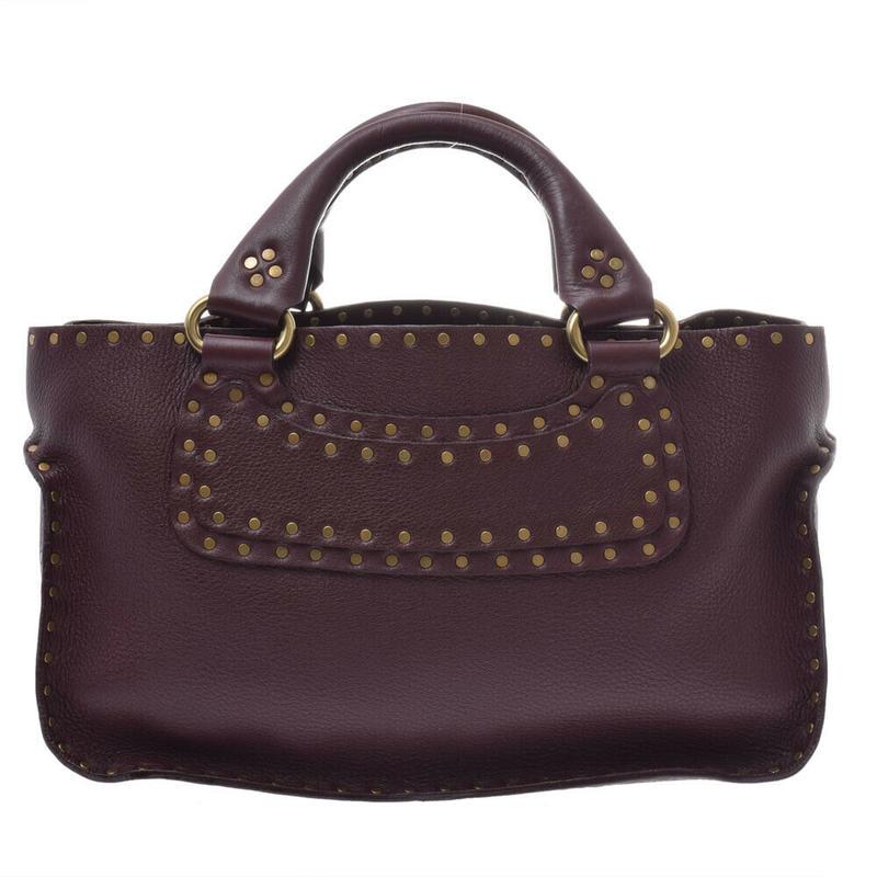 Céline Boogie bag wine-red: Brand: Céline Model: Boogie bag wine-red Color: Brown Material: Leather Dimensions: H:20cm x W:32cm x D:13cm Serial number: NA Country of origin: Italie Condition: AB - good condition. May have some