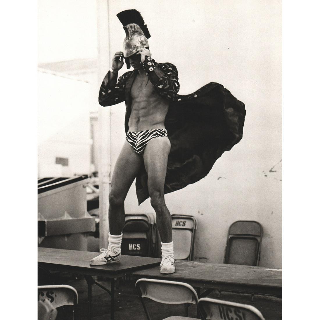 BRUCE WEBER - Billy, Extra at Zoetrope Studios, LA 1986: Artist: BRUCE WEBER Print Title: Billy, Extra at Zoetrope Studios, LA 1986 Medium: Sheet-fed Gravure Printing Date: 1980's Printed in Spain Image Size approx: 11 X 9 inches Bruce Weber is an American