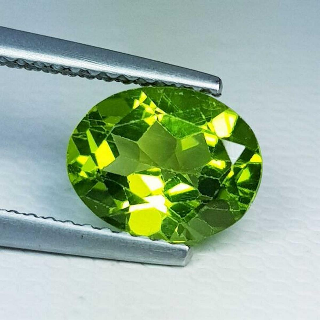 Natural Peridot Oval Cut 1.90 ct: No Reserve! Title: Natural Peridot Oval Cut 1.90 ct Color/Clarity: IF - VVS Gemstones: Loosegemstone Carat Weights: 1.9 Size/Dimensions: 8.80 x 7.10 x 4.40 Additional Information: Oval - Pakistan Ship