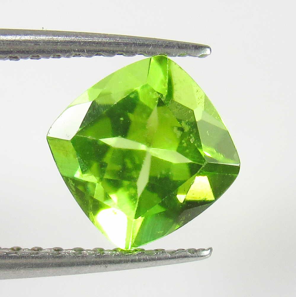 1.58 Ctw Natural Pakistan Peridot 7X7 mm Cushion Cut: No Reserve! Title: 1.58 Ctw Natural Pakistan Peridot 7X7 mm Cushion Cut Stone Clarity: VVS Loose Gemstone: Peridot Carat Weights: 1.58 Size/Dimensions: 6.90 x 6.90 x 4.50 mm Top Class Luster / Excelle