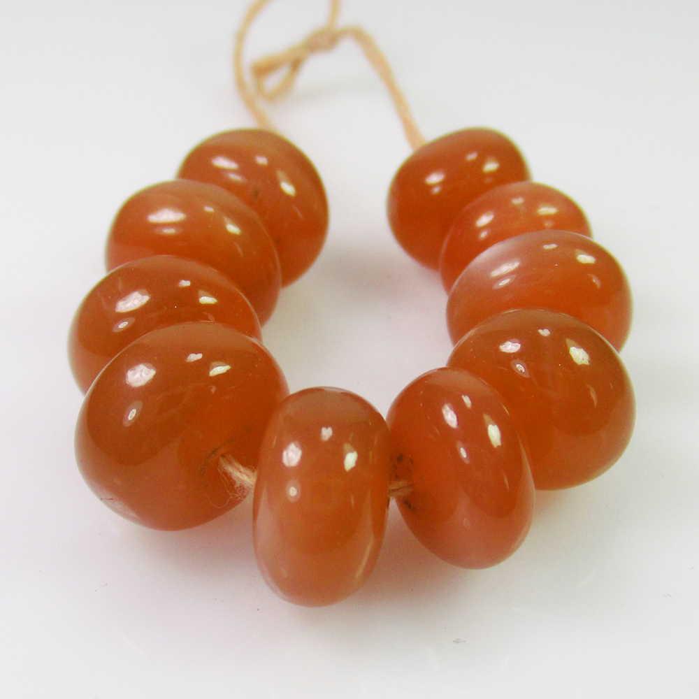 43.55 Ct Genuine 10 Drilled Moonstone Round Beads: No Reserve! Title: 43.55 Ct Genuine 10 Drilled Moonstone Round Beads Stone Clarity: Semi-Transparent Loose Gemstone: Natural Moonstone Beads Carat Weights: 43.55 Size/Dimensions: 9.20 - 10.40 mm / 10