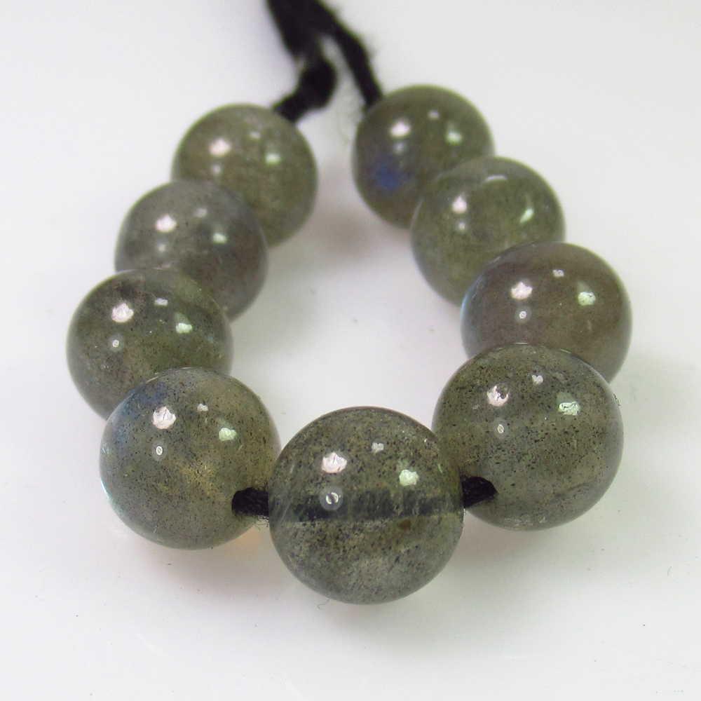 29.32 Ct Genuine 9 Labradorite Drilled Round Ball Beads: No Reserve! Title: 29.32 Ct Genuine 9 Labradorite Drilled Round Ball Beads Stone Clarity: Transparent Loose Gemstone: Natural Labradorite Beads Carat Weights: 29.32 Size/Dimensions: 7.90 - 8.10 mm / 9