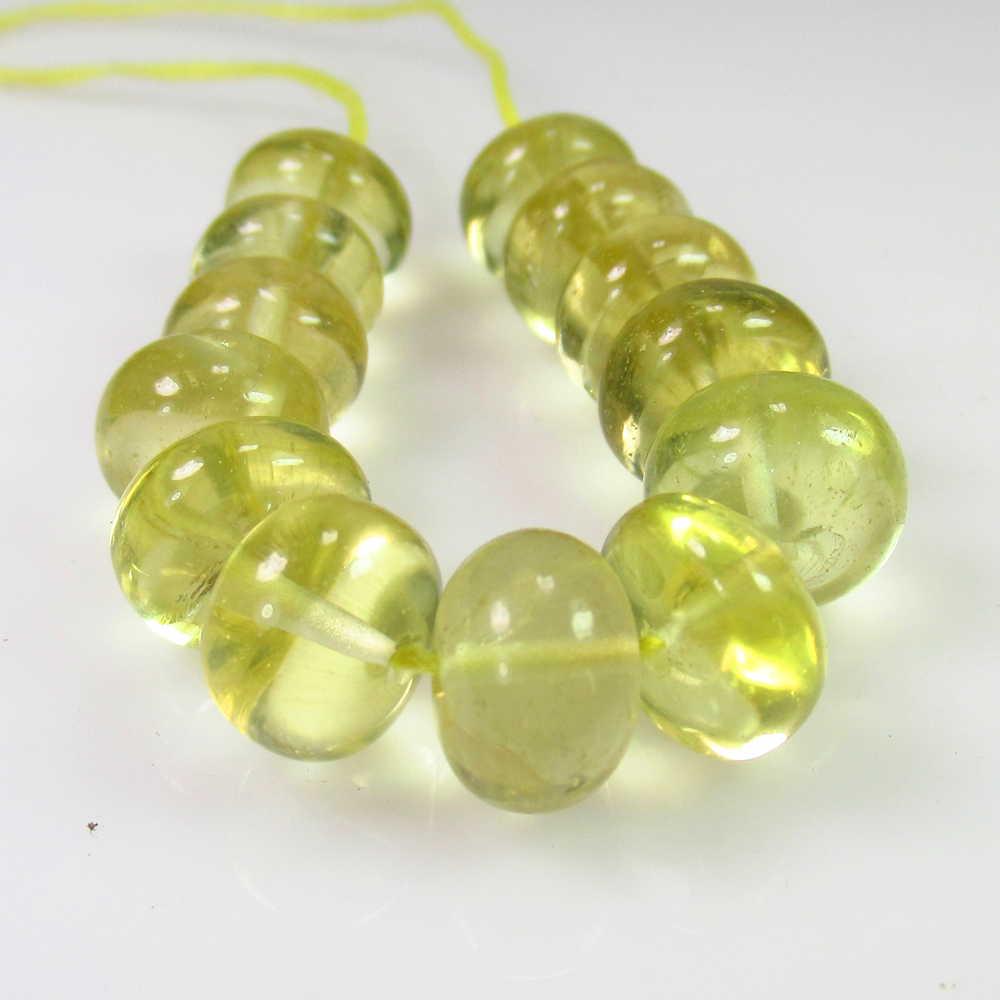 57.08 Ct Genuine 13 Lemon Quartz Drilled Round Beads: No Reserve! Title: 57.08 Ct Genuine 13 Lemon Quartz Drilled Round Beads Stone Clarity: Transparent Loose Gemstone: Natural Lemon Quartz Beads Carat Weights: 57.08 Size/Dimensions: 9.40 - 10.10 mm / 13