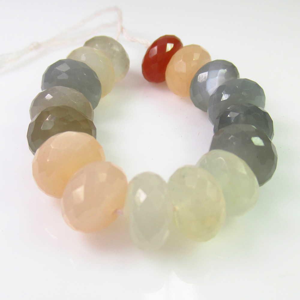 59.81 Ct Genuine 16 Drilled Moonstone Round Beads: No Reserve! Title: 59.81 Ct Genuine 16 Drilled Moonstone Round Beads Stone Clarity: Semi-Transparent Loose Gemstone: Natural Moonstone Beads Carat Weights: 59.81 Size/Dimensions: 9.10 - 9.50 mm / 16 P