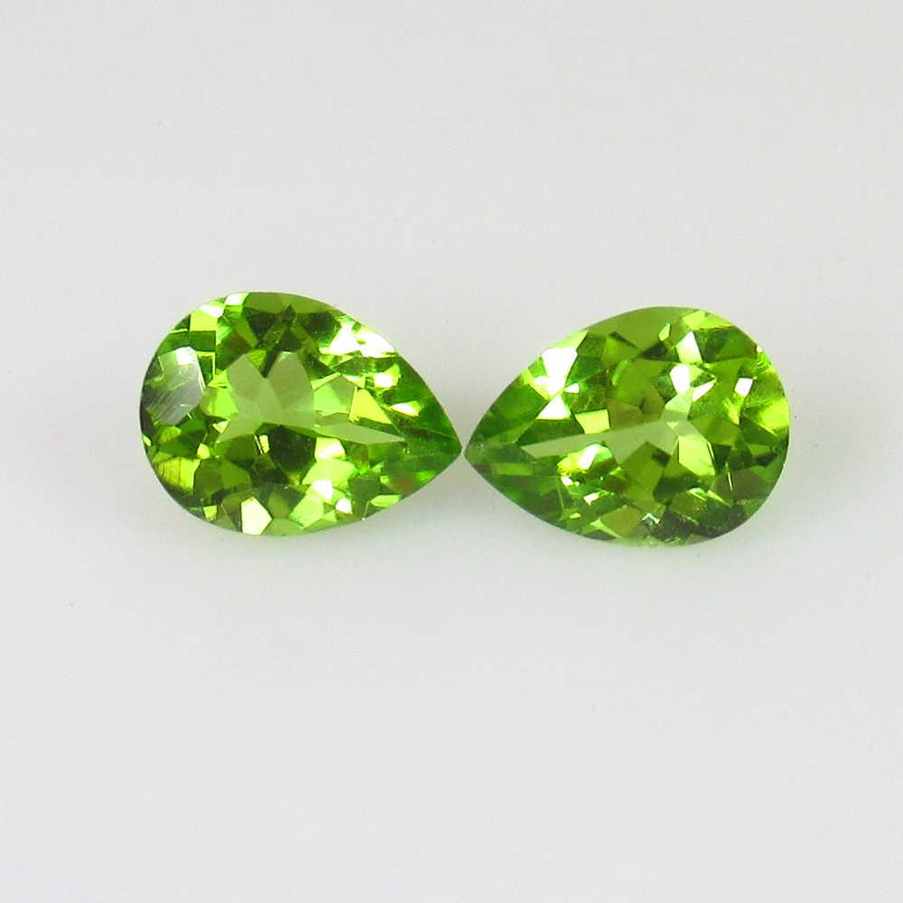 2.29 Ct Genuine Pakistan Peridot Pear Pair: No Reserve! Title: 2.29 Ct Genuine Pakistan Peridot Pear Pair Stone Clarity: VVS Loose Gemstone: Natural Peridot Carat Weights: 2.29 Size/Dimensions: 7.90 x 5.90 x 3.90 mm / 2 PC's Top Class Full Lust