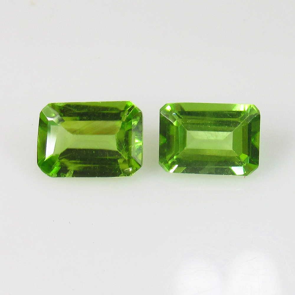 2.95 Ct Genuine Pakistan Peridot Octagon Pair: No Reserve! Title: 2.95 Ct Genuine Pakistan Peridot Octagon Pair Stone Clarity: VVS Loose Gemstone: Natural Peridot Carat Weights: 2.95 Size/Dimensions: 8.10 x 5.90 x 3.60 mm / 2 PC's Top Class Full L