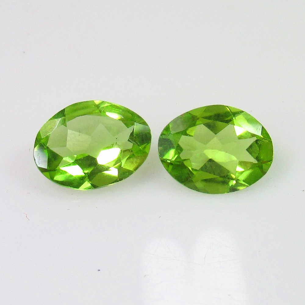 2.78 Ct Genuine Pakistan Peridot Oval Pair: No Reserve! Title: 2.78 Ct Genuine Pakistan Peridot Oval Pair Stone Clarity: VVS Loose Gemstone: Natural Peridot Carat Weights: 2.78 Size/Dimensions: 9.00 x 6.70 x 3.50 mm / 2 PC's Top Class Full Lust