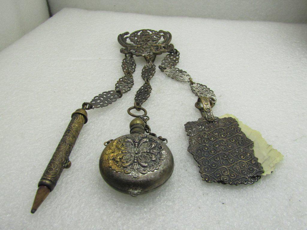 Victorian Chatelaine, Three Drops, Flask, Pencil,: Antique Victorian Chatelaine, three filigree chains one with a bottle/flask, one with a pencil that fits into a locking holder, and the other a tablet that has a front and back scrolled metal cover wi