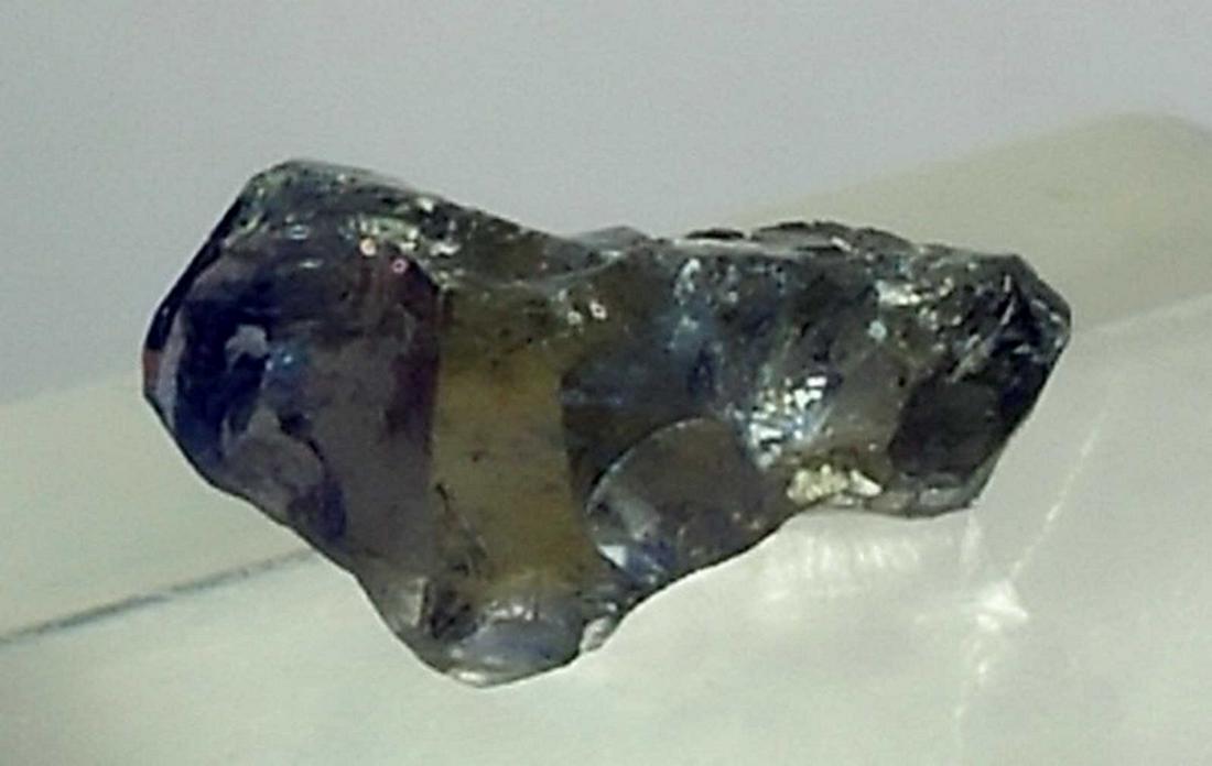 Natural & unheated~ Blue Iolite Rough: Title: Natural & unheated~ Blue Iolite Rough Color/Clarity: Blue Gemstone Type: Rough Carat Weights: 3.80 Cts Size/Dimensions: 12x8x7 mm Reserve: $15.99 Shipping: Domestic: Flat-rate of $12.00 to anyw