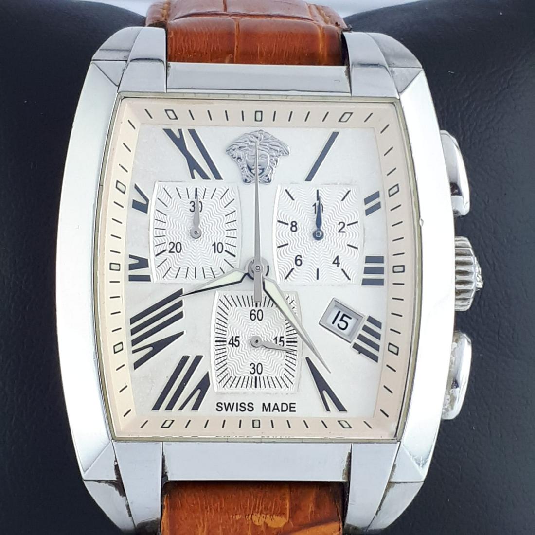 Versace - Tonneau Chronograph - Ref: WLC99 - Men -: Brand: Versace Model: Tonneau Chronograph Reference Number: Ref: WLC99 Gender: Men Period: 2011-present Movement: Quartz Case material: Steel Type: Chronograph wristwatch Shipped Insured: Yes Conditio