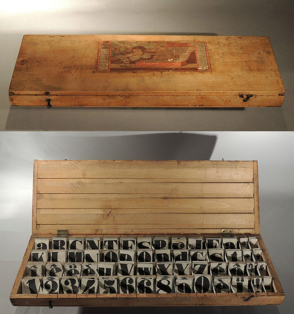 ABC Spelling Game In A Wooden Box: Title: ABC Spelling Game In A Wooden Box Date/Period: Late 19th Century Origin: French Dimension: 2" H x 23" L x 7 5/8" D Provenance:Spelling game ~ Child's Mobile Alphabet spelling game in a wooden b