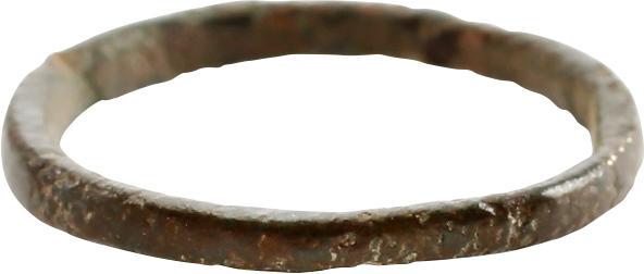 VIKING WOMAN’S WEDDING RING 10TH-11TH CENTURY AD SZ 1 ½: No Reserve! Danelaw England. Narrow rounded face band, 1.7mm. Size 1 ½ for the small finger as was the custom. Vikings exchanged rings on the pommel of the groom’s sword. Surface with attractive gl