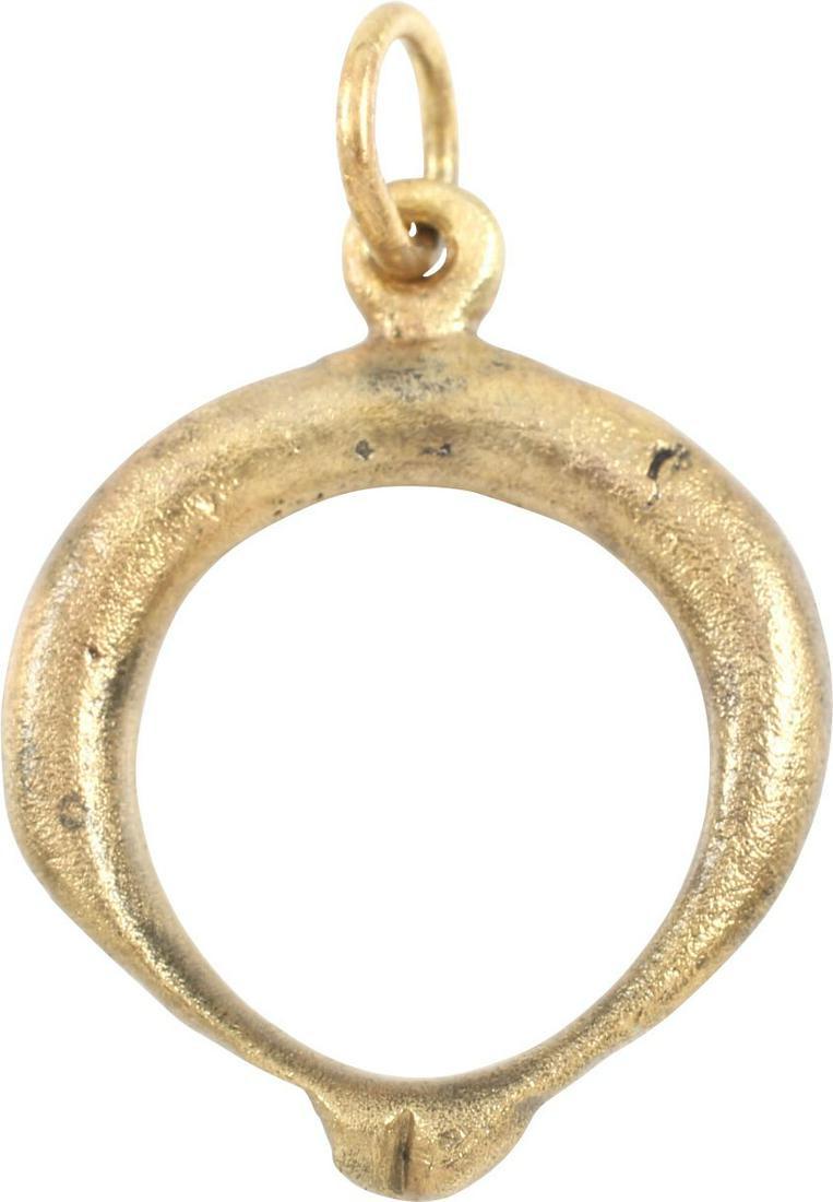FINE VIKING LUNAR PENDANT C.870-1050 AD: Cambridgeshire, England. 1 1/8” height of fully rounded section, tapering to the tips, each of which are swelled to represent Sol the Sun and Mani the Moon, and are touching, perhaps to represent an
