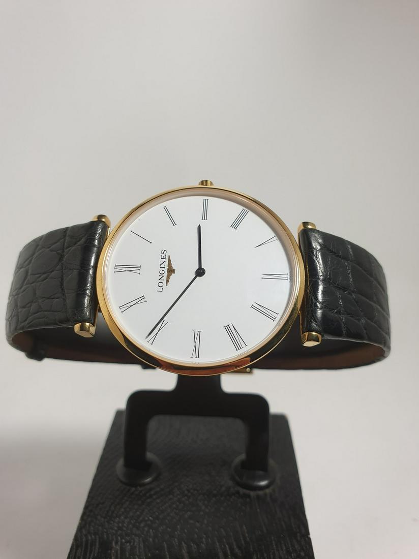 Longines La Grande Classique L4.705.2: Title: Longines La Grande Classique L4.705.2 Brand: Longines Date: 2000-2010 Model: La Grande Classique Movement: Quartz Functions: Hours, minutes Case Metal: Gold-plated steel Case Size: 30*33 mm Dia