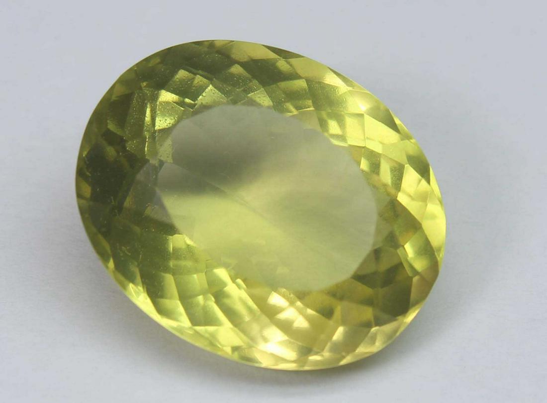 13.54 Ct Natural Lemon Quartz: No Reserve! Gemstone : Natural Lemon Quartz Weight : 13.54 Cts Shape : Oval Cut Colour : Greenish Yellow Dimensions : 17.9x14.5x8.9 mm Origin : Africa Transparency: transparent Shipping: Worldwide: Fl