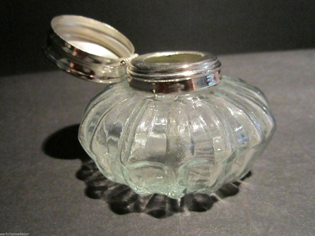 Round Clear Glass Thick Glass Inkwell Ink pot Bottle: Vintage Antique Style Round Solid Clear Thick Glass Inkwell Ink pot Description 2 1/4" High x 3 1/8" wide Charming Reproduction antique green glass inkwell ink bottle. Very heavy thick glass each with