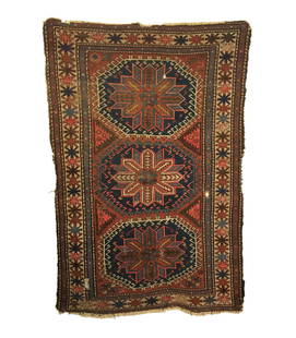 Antique Caucasian Shirvan Rug 3'4 x 5'0: This antique vintage Caucasian rug was woven in the late 19th Century. It features three central flower blossom motifs that have sharp radiating leaves. The center flower is common referred to as the