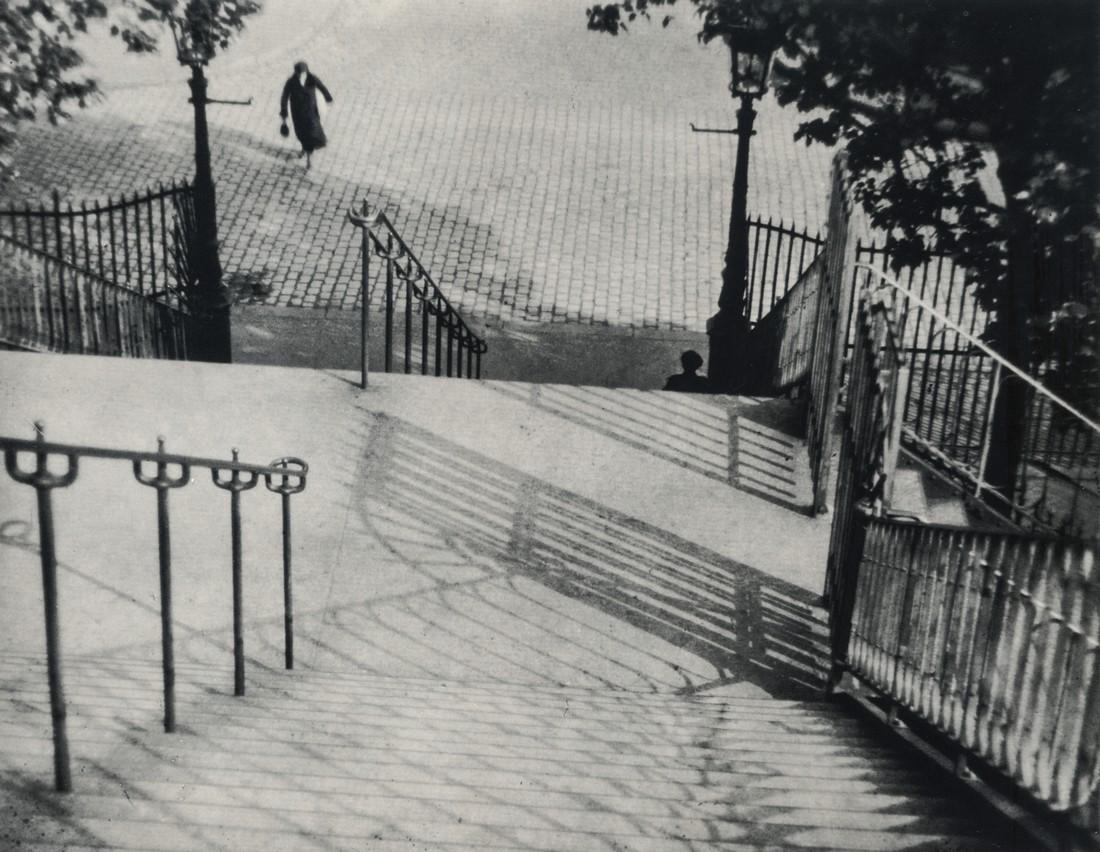 ANDRE KERTESZ - The Stairs of Montmarte, Paris, 1925: Artist: Andre Kertesz Title: The Stairs of Montmarte, Paris, 1925 Medium: Photo Litho, 1982, Canada Dimensions: 6.75x5.25" Heat Wax Mounted on 8.5x11" Conservation Board Andre Kertesz, born Kertesz An