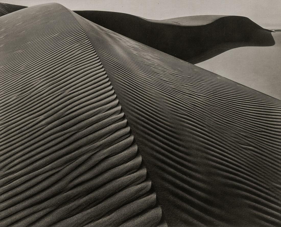 BRETT WESTON - Windswept Dune, Oceano, California, 1947: Artist: Brett Weston Title: Windswept Dune, Oceano, California, 1947 Medium: Photo Litho, 1998, USA Dimensions: 6.7x5.4" Heat Wax Mounted on 8.5x11" Conservation Board Brett Weston 1911-1993) was an A