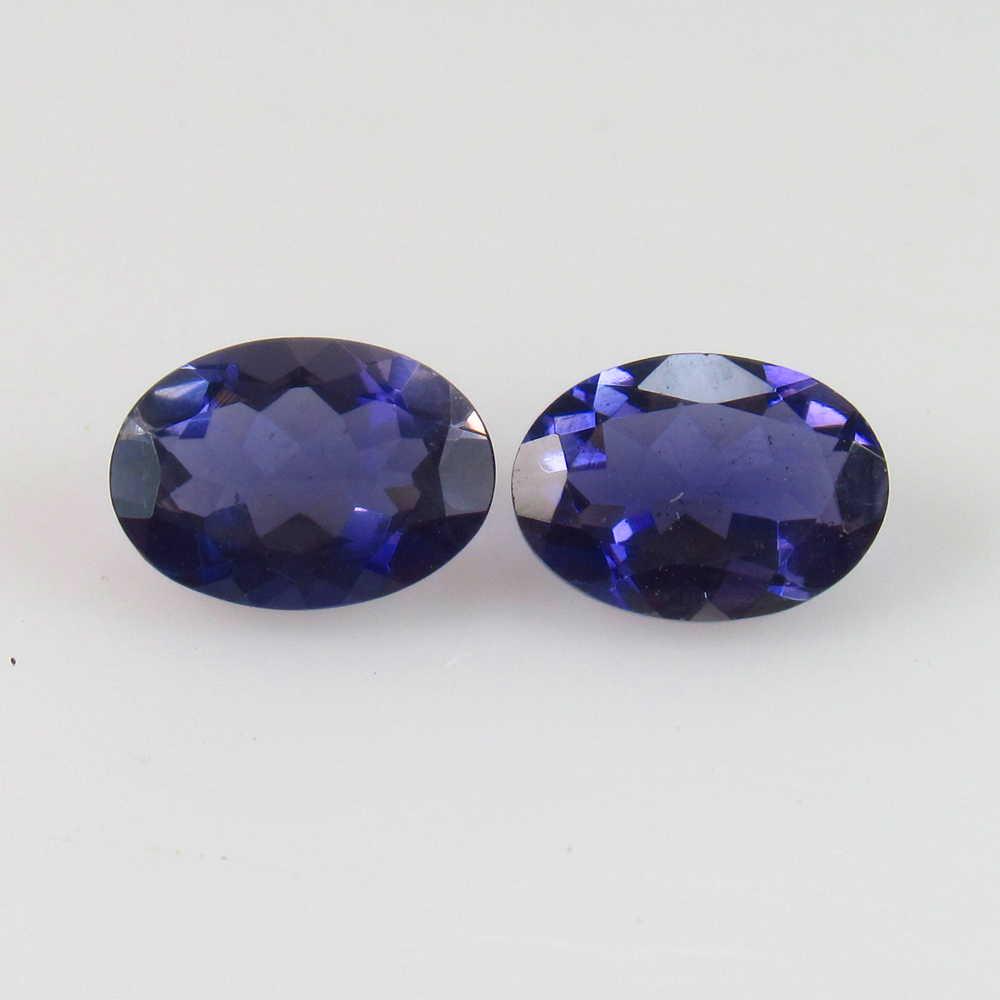 1.30 Ctw Natural Iolite Oval Pair: No Reserve! Title: 1.30 Ctw Natural Iolite Oval Pair Stone Clarity: VVS Gemstones: Iolite Carat Weights: 1.30 Size/Dimensions: 7.10 x 5.10 x 3.00 mm / 2 PC's Additional Information: Very Good Luster /