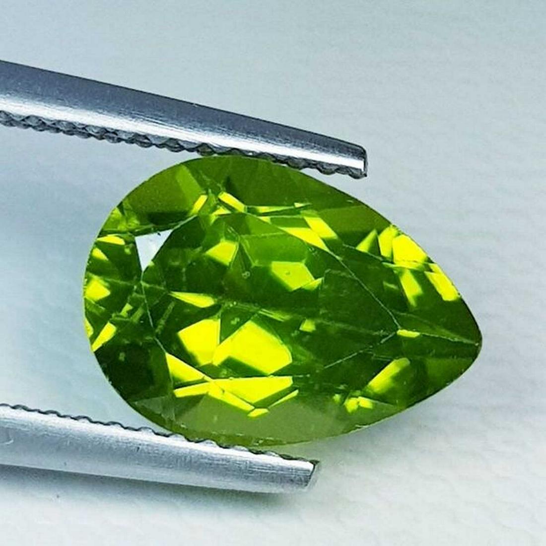 3.38 ct Natural Peridot Pear Cut: No Reserve! Title: 3.38 ct Natural Peridot Pear Cut Color/Clarity: VVS Gemstones: Loosegemstone Carat Weights: $3 Size/Dimensions: 11.00 x 7.90 x 6.00 Additional Information: Pear - Pakistan Shipping: