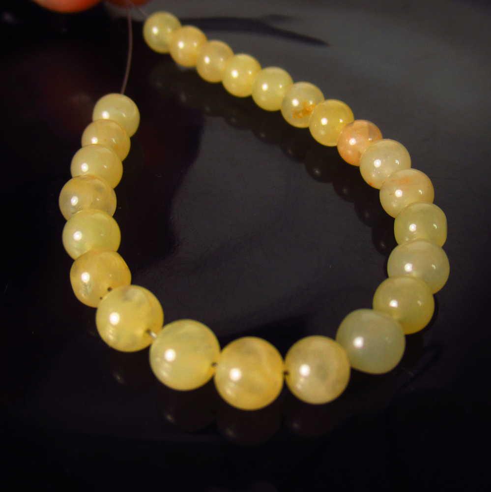 21.20 Ct Genuine 24 Drilled Moonstone Ball Beads: No Reserve! Title: 21.20 Ct Genuine 24 Drilled Moonstone Ball Beads Stone Clarity: Semi-Transparent Gemstone: Natural Moonstone Beads Carat Weights: 21.20 Size/Dimensions: 4.90 - 5.30 mm / 24 PC's Dri