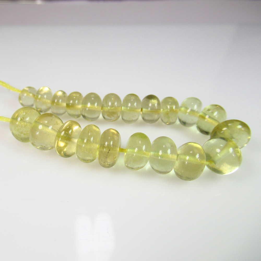 31.89 Ct Genuine 21 Lemon Quartz Round Beads: No Reserve! Title: 31.89 Ct Genuine 21 Lemon Quartz Round Beads Stone Clarity: Transparent Gemstone: Natural Lemon Quartz Beads Carat Weights: 31.89 Size/Dimensions: 5.60 to 7.50 mm / 21 PC's Top Clas