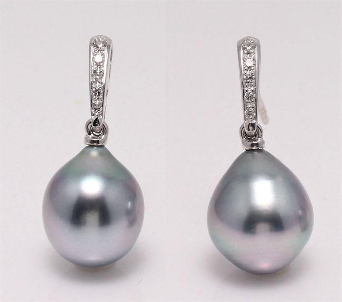 14 kt. White Gold - 9x10mm Peacock Tahitian Pearls -: Produced by the Pinctada Margaritifera oyster in the tropical lagoons of French Polynesia, these pearls have a natural magnificent peacock green colour with a bright luxurious lustre. The white gold a