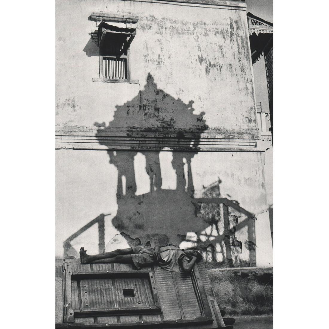 HENRI CARTIER-BRESSON - In the Shadow of the Church: Artist: HENRI CARTIER-BRESSON Print Title: In the Shadow of the Church Medium: Sheet-fed Gravure Printing Date: 1960s Printed: Italy Image Size approx: 11 x 7.5 inches Henri Cartier-Bresson(1908-2004)