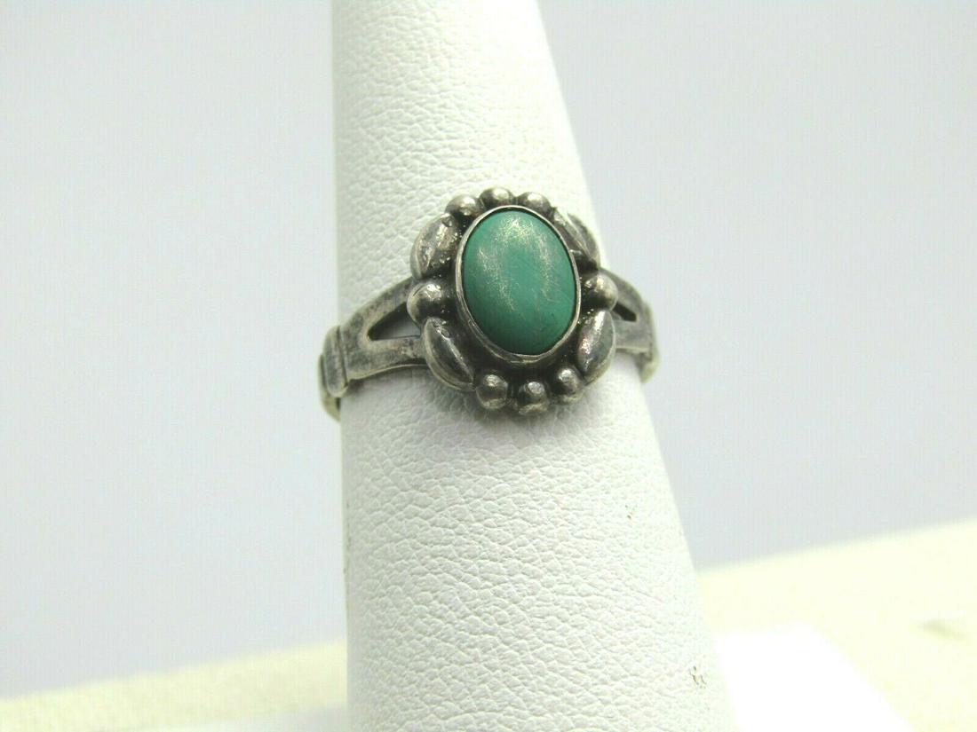 Vintage Sterling Southwestern Malachite Ring, Navajo,: Vintage Sterling Southwestern Malachite Ring, Navajo, size 6.5 and weight is appx. 3.1 grams. It is signed with a Jm mark. Also marked .925 and tested. The stone is an oval malachite that is appx. 9mm