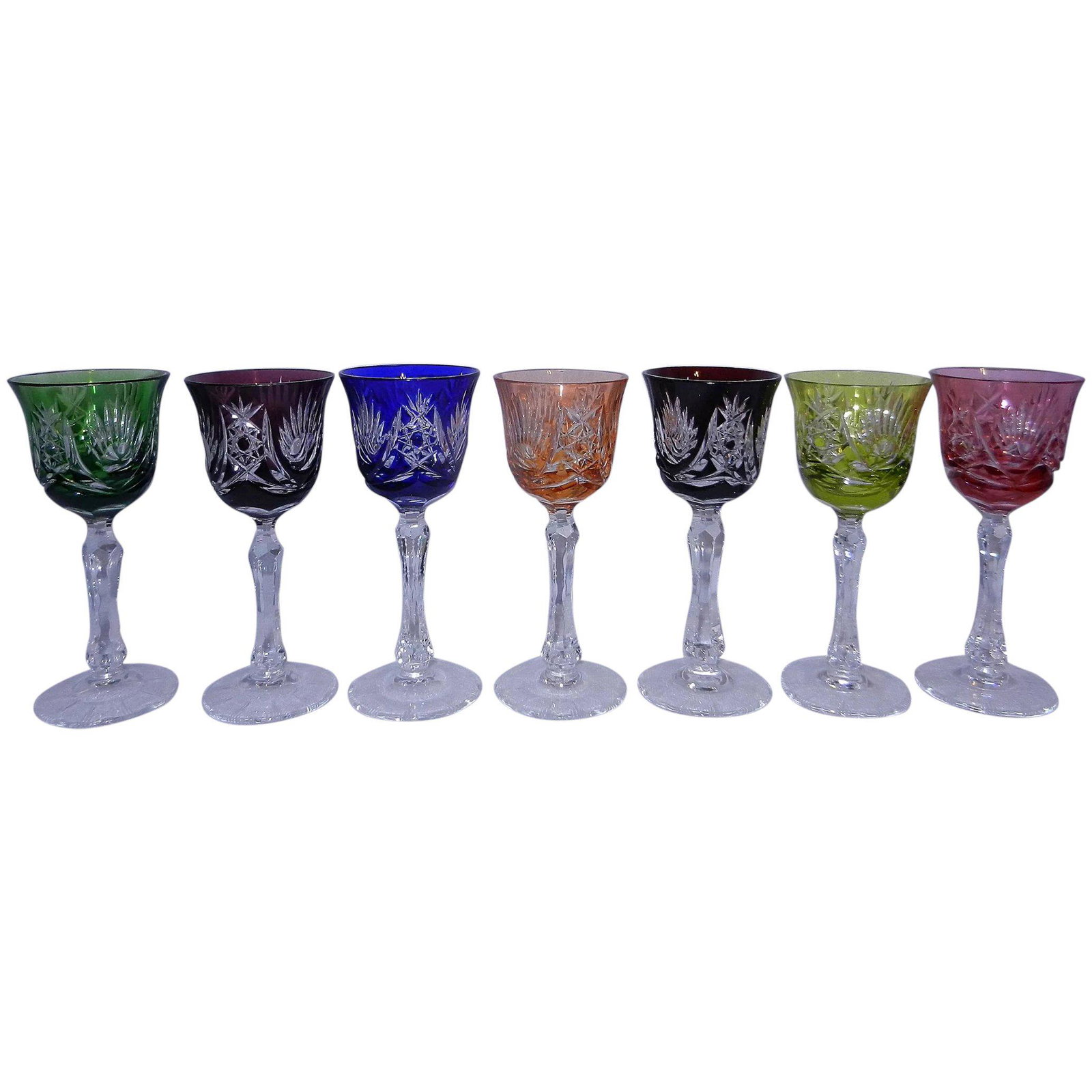 Vintage Bohemian Czechoslovakian Multi-Colored Cut to: This set of 7 Vintage Bohemian Czechoslovakian Multi-Colored Cut to Clear Liqueur Cordial Glasses are in near MINT condition. NO flea bites, or other problems. Most likely these were used as display i