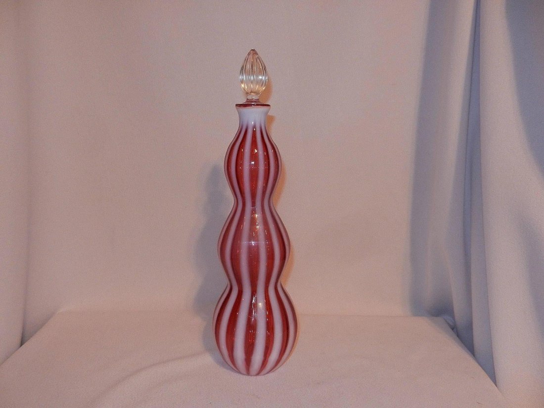Vintage Mid-Century Fenton New World Rib Optic Art: Fenton New World Rib Optic Cranberry Opalescent Wine Bottle 1953 Art Glass 12" Decanter is in EXCELLENT CONDITION! THE FIRST PICTURE WAS OF THE OTHER ONE I HAD LISTED THE 2ND PICTURE AND THE REST ARE 