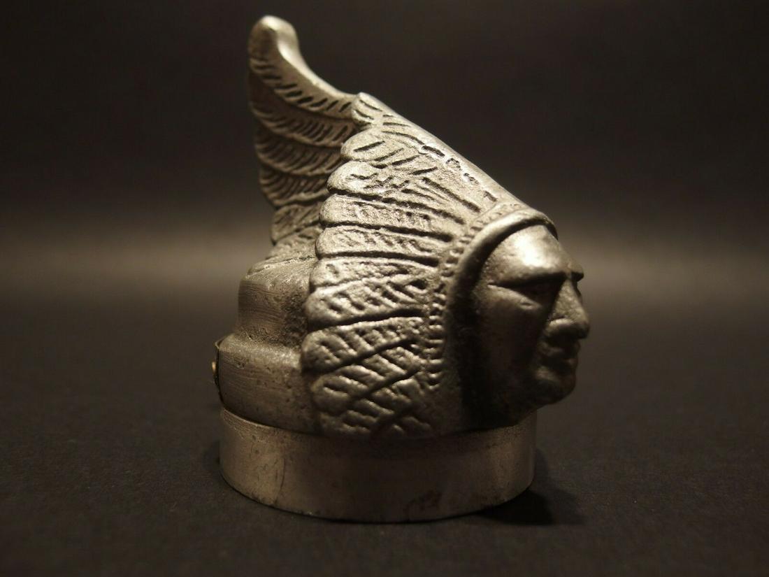 Aluminum Indian Motorcycle Bottle Cap Opener: Description 3 3/4" Tall x 2 1/2" Wide Well made reproduction Indian Motorcycle aluminum bottle cap opener. Nice detailed piece!.. The opener is on the bottom of the piece. Good heavy solid bottle cap