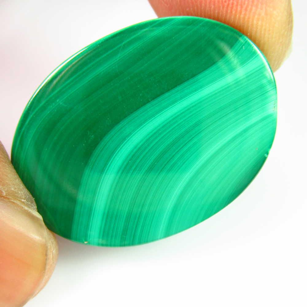 51.97 Ct Genuine Green Malachite 29X22 mm Oval Cab: No Reserve! Title: 51.97 Ct Genuine Green Malachite 29X22 mm Oval Cab Stone Clarity: Opaque Gemstone: Natural Malachite Carat Weights: 51.97 Size/Dimensions: 29.00 x 22.00 x 7.50 mm Nice Oval Cabochon