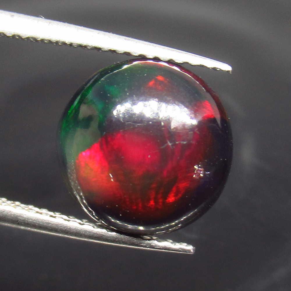2.70 Ct Geuine Ethiopian Fire Black Opal Round Cab: No Reserve! Title: 2.70 Ct Geuine Ethiopian Fire Black Opal Round Cab Stone Clarity: Translucent Gemstone: Natural Black Opal Carat Weights: 2.70 Size/Dimensions: 10.40 x 10.40 x 5.30 mm Excellent Rou