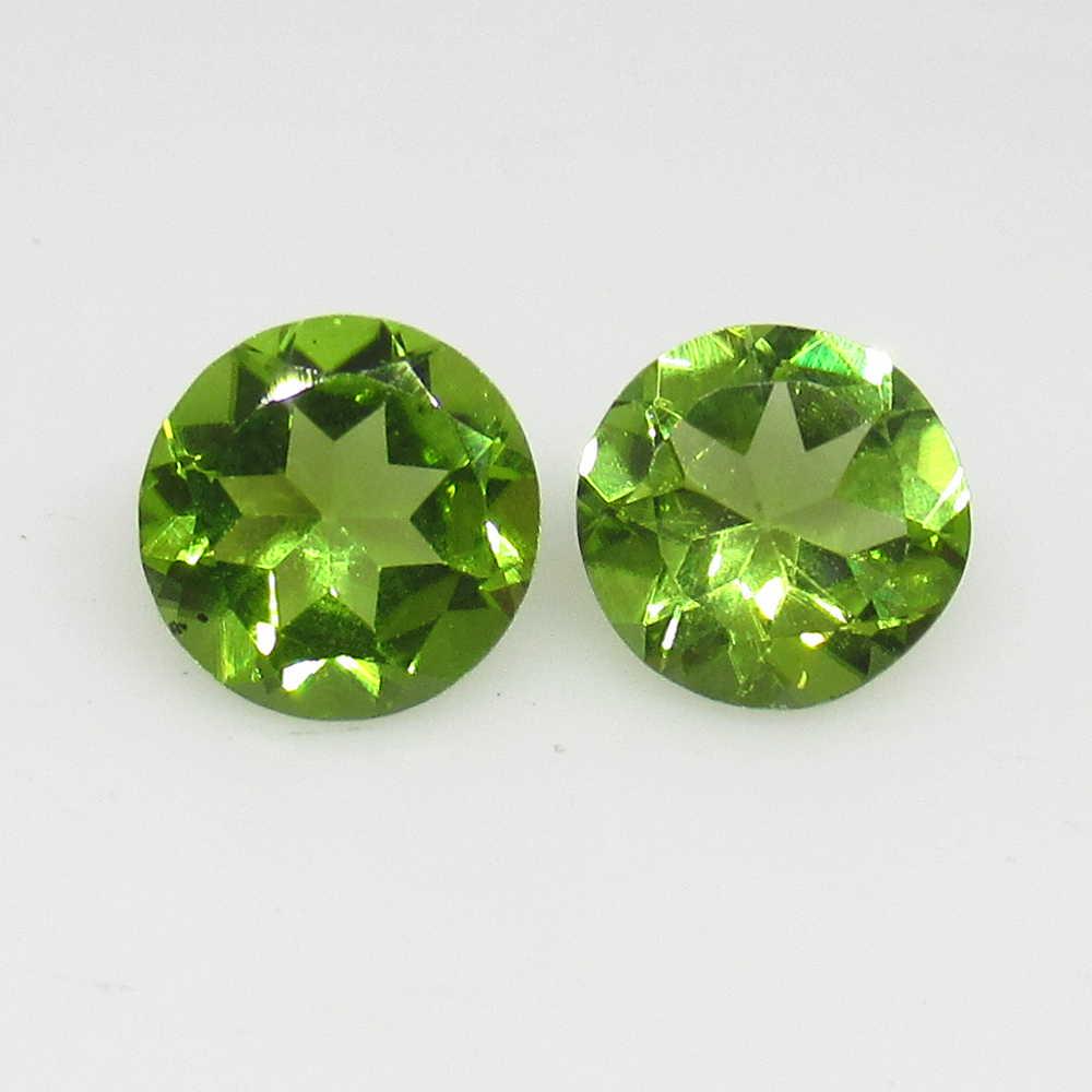 2.22 Ct Genuine Pakistan Peridot Round Pair: No Reserve! Title: 2.22 Ct Genuine Pakistan Peridot Round Pair Stone Clarity: VVS Gemstone: Natural Peridot Carat Weights: 2.22 Size/Dimensions: 7.10 x 7.10 x 4.20 mm / 2 PC's Top Class Full Luster / 
