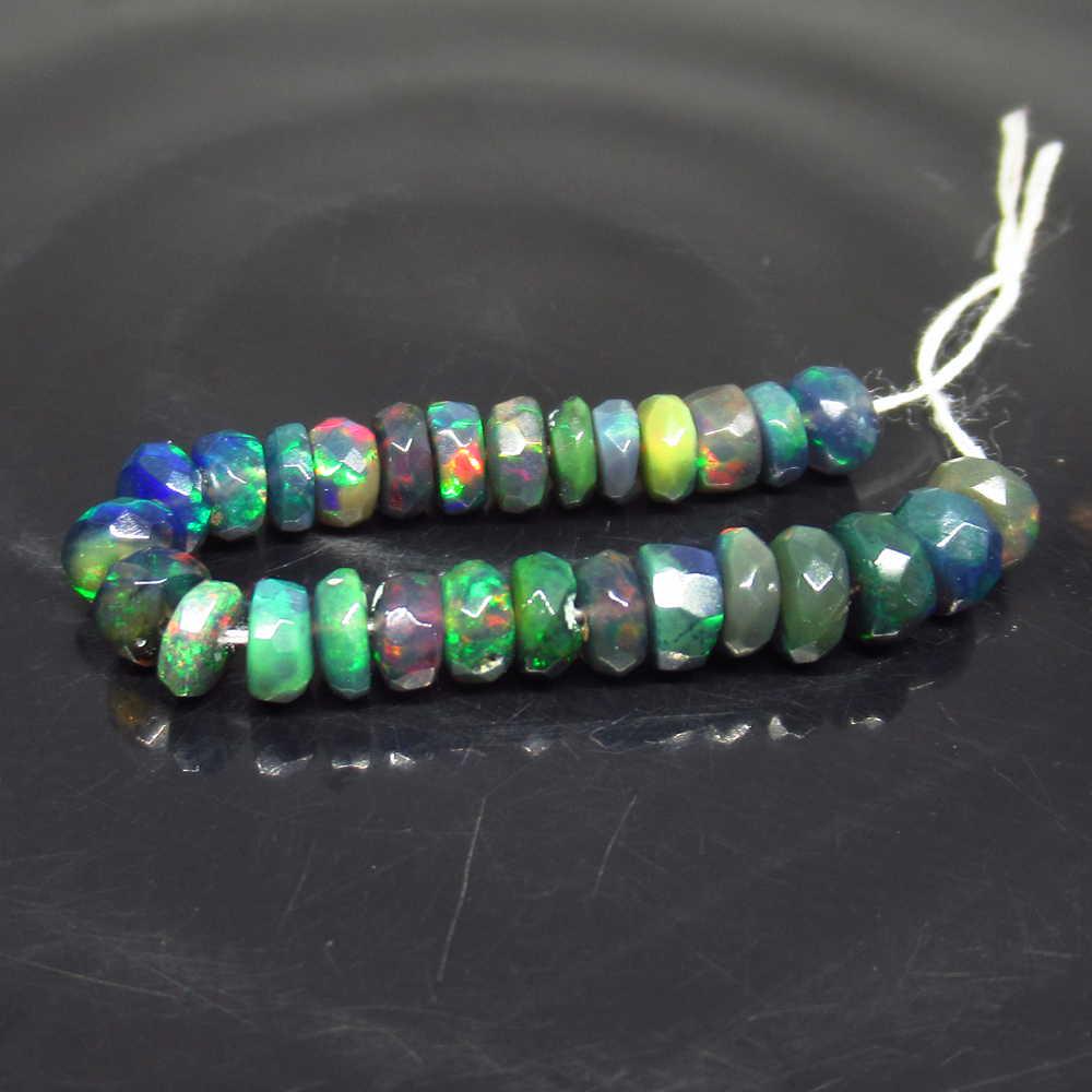 5.72 Ct Genuine 28 Drilled Faceted Fire Black Opal: No Reserve! Title: 5.72 Ct Genuine 28 Drilled Faceted Fire Black Opal Beads Stone Clarity: Translucent Gemstone: Natural Faceted Black Opal Beads Carat Weights: 5.72 Size/Dimensions: 4.20 to 4.40 mm /